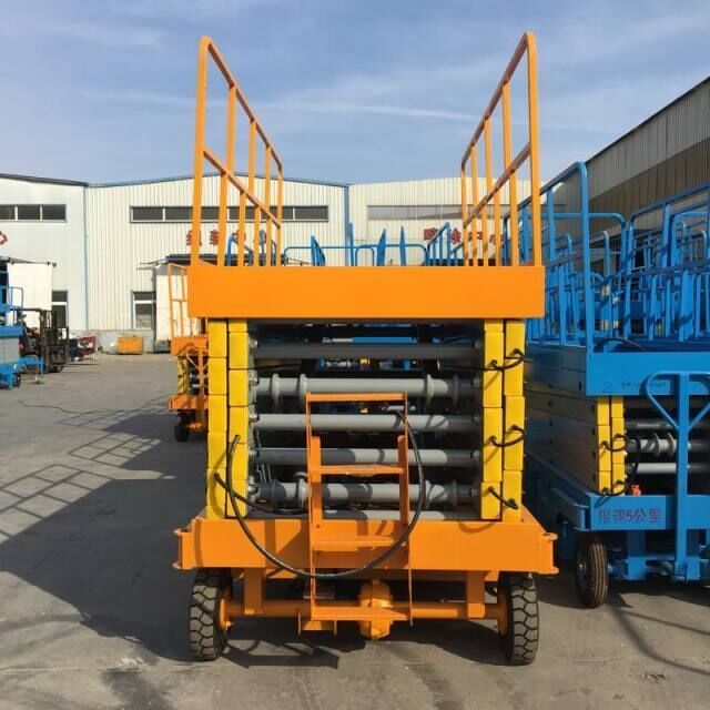 300kg 6m 4 wheels Mobile  electric hydraulic  scissor lift working platform  for aerial work