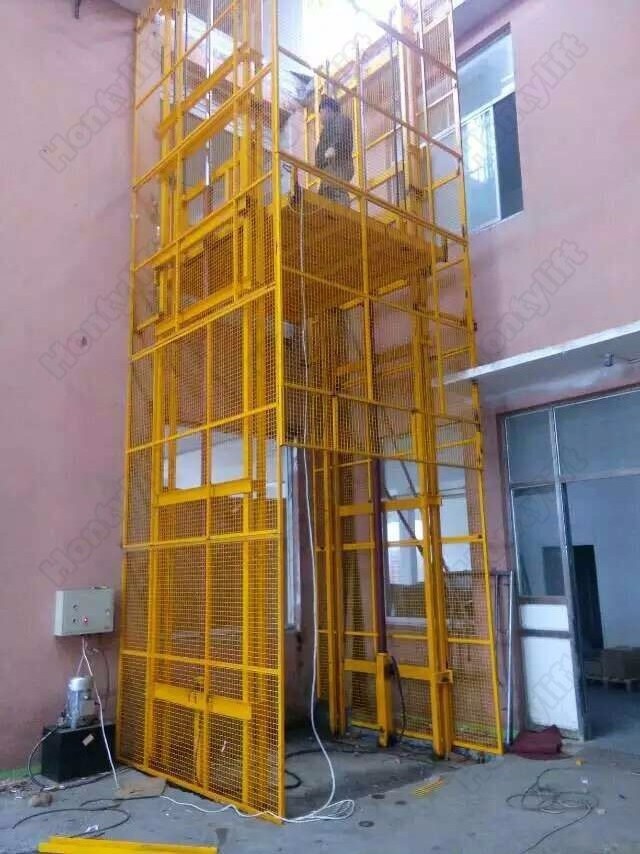 Indoor and outdoor use cargo elevator fixed vertical material lifting table guide rail lift