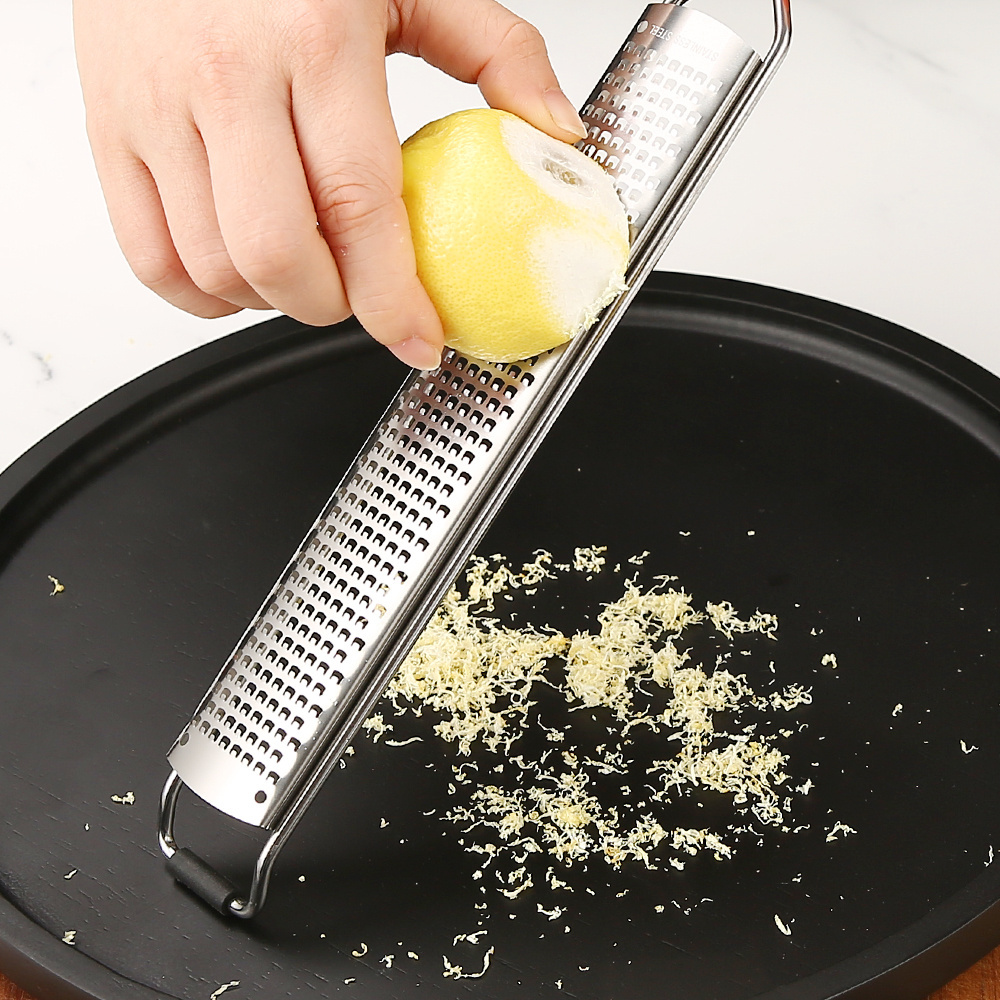 wholesale kitchen gadgets non slip handle multi functional vegetable coconut cheese grater Lemon peel scraper