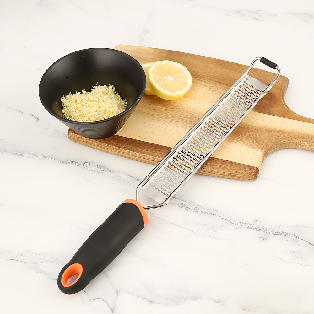 wholesale kitchen gadgets non slip handle multi functional vegetable coconut cheese grater Lemon peel scraper