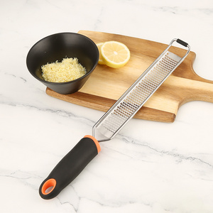 wholesale kitchen gadgets non slip handle multi functional vegetable coconut cheese grater Lemon peel scraper