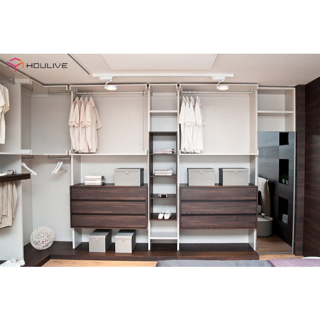 Modern walk in wardrobe designs with closet island middle