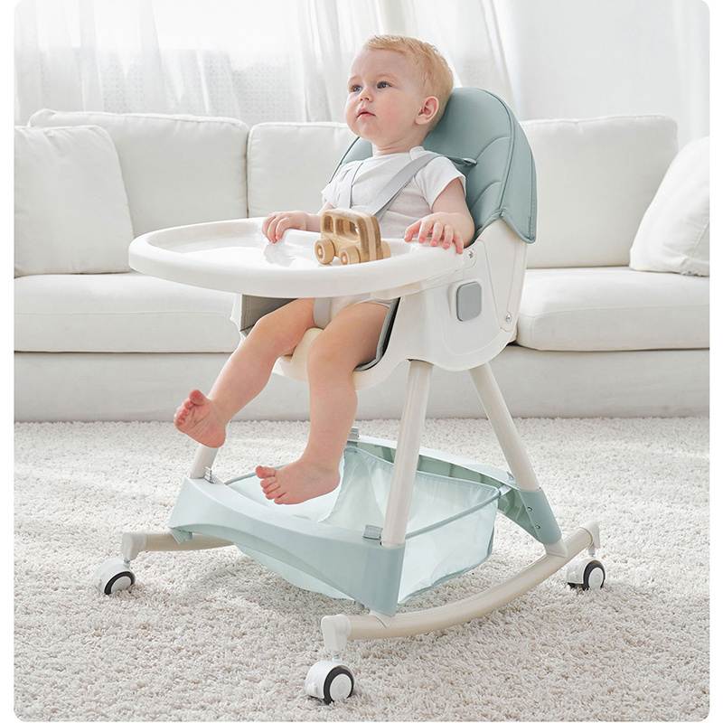 Multi-functional baby dining chair converts into rocker and high chair comes with wheel