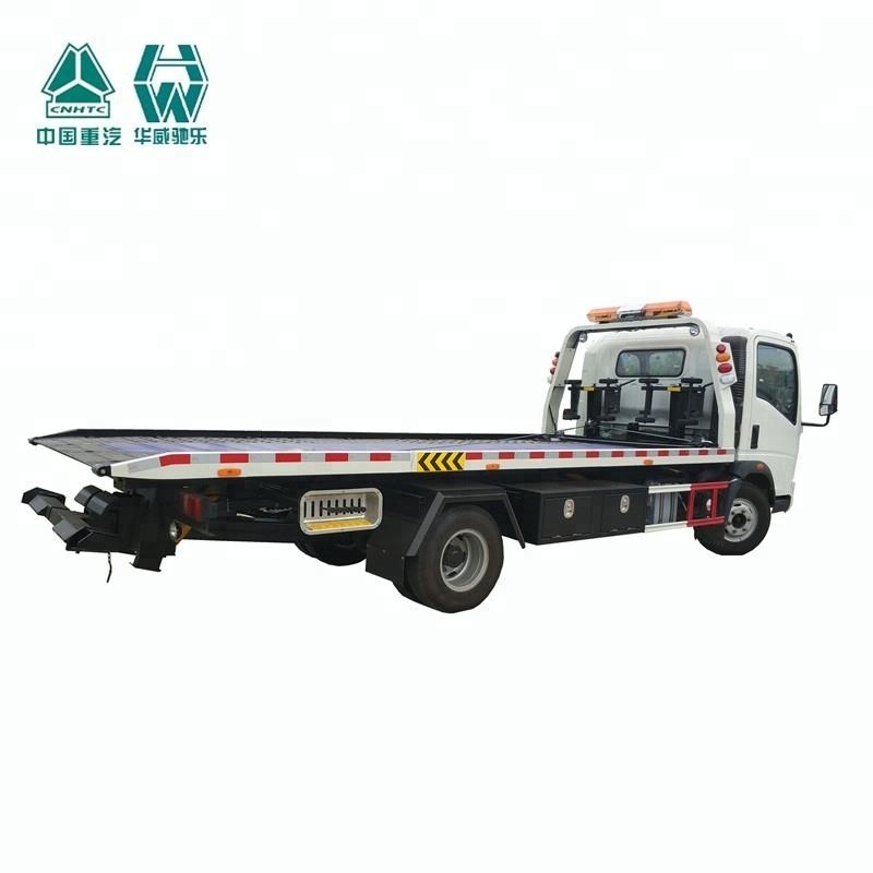 HOWO 4x2 New condition flat bed wrecker towing truck