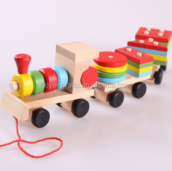 hand painting children play wooden train