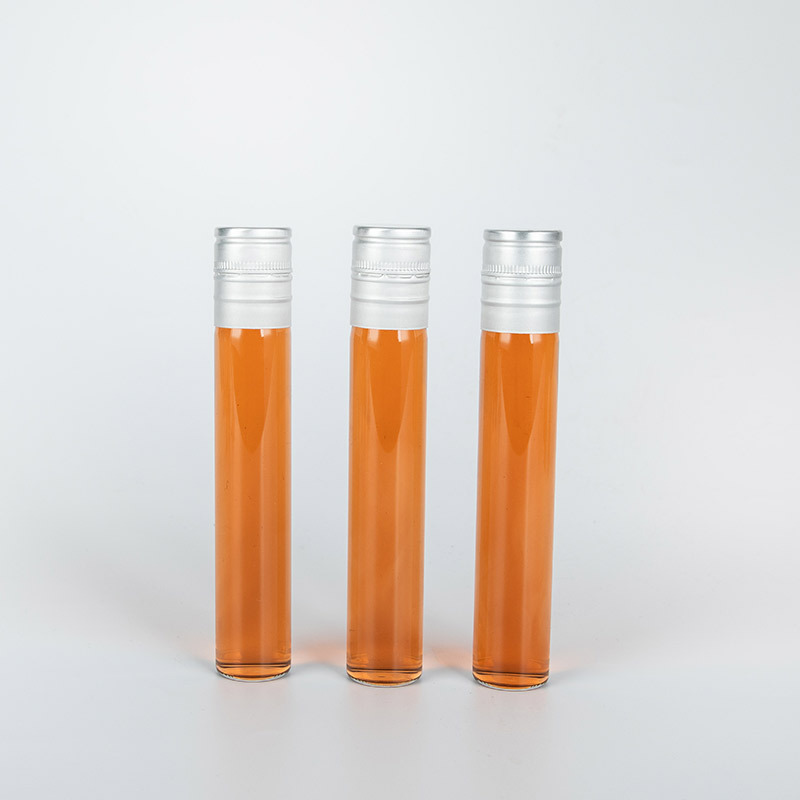 Hot sale Glass mini tubes 2oz 4oz glass spirit bottles mini transparent wine bottle with aluminum screw lid