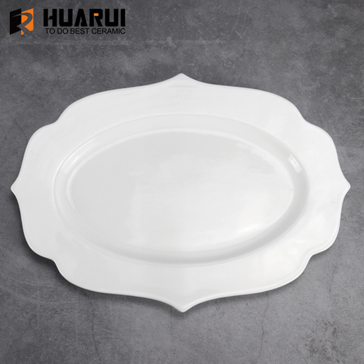 custom hot sale ceramic dinner plates cheap bulk flat white porcelain wedding oval decorative plate