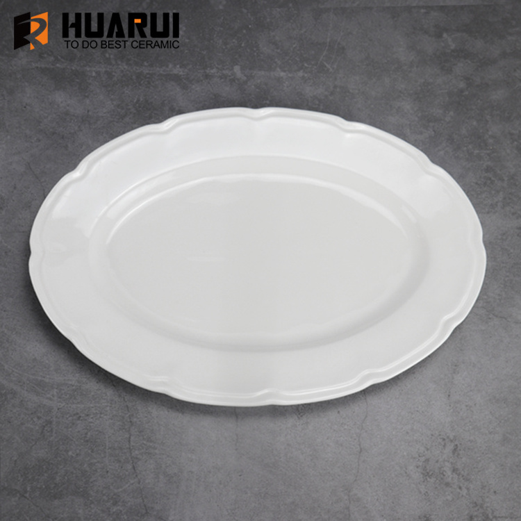 custom hot sale ceramic dinner plates cheap bulk flat white porcelain wedding oval decorative plate