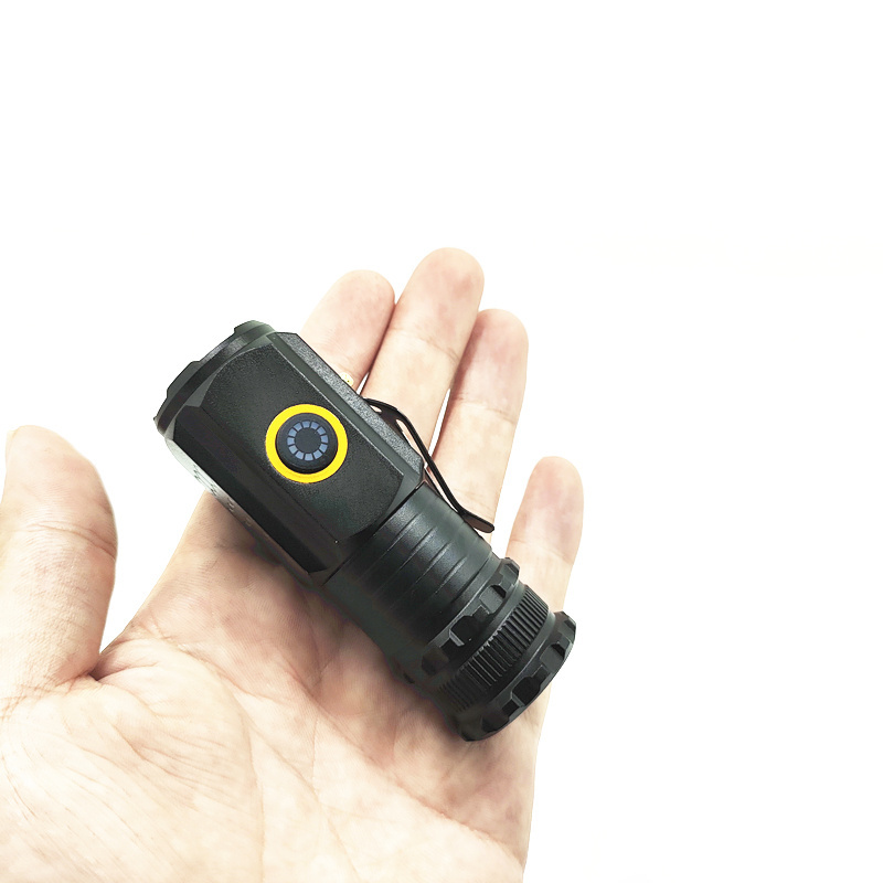 The new strong light long range flashlight illuminates the mini portable small hand electric outdoor multi-function clip cap lig