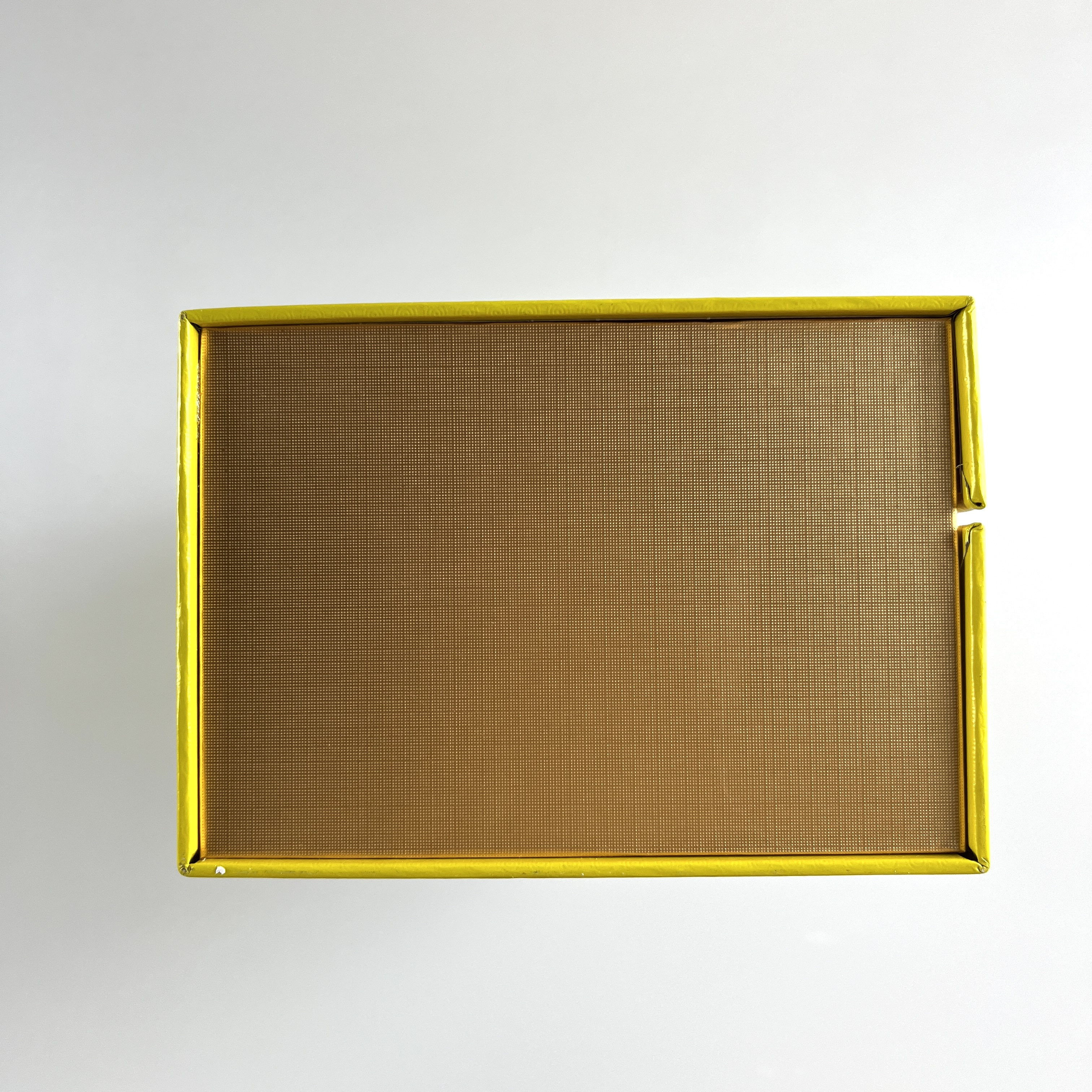 Yellow rectangular drug packaging box for filling medicine bottles and cans