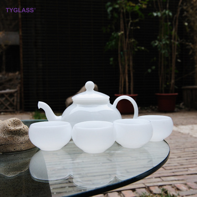 Custom Antique bulk fine bone china borosilicate glass tea cup and pot opaque white color tea cup and saucer set