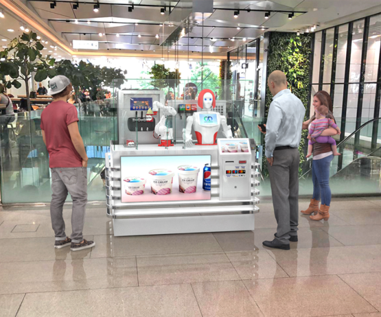 Robotic ice cream vending machine automatically operates the frozen ice cream machine