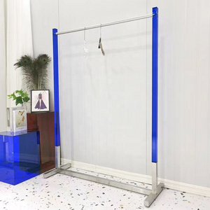 Luxury acrylic clothing store display rack for boutique clothing store with wheels