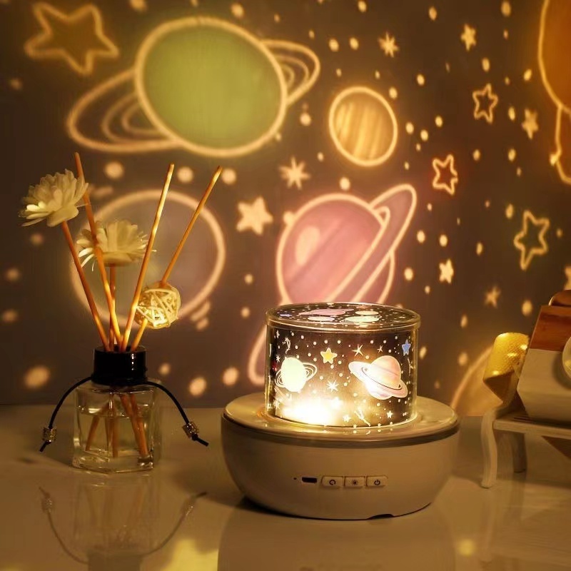 Hot selling remote control USB music rotation color constellation projection small light night light