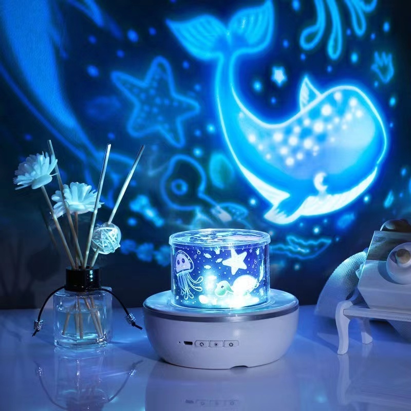 Hot selling remote control USB music rotation color constellation projection small light night light