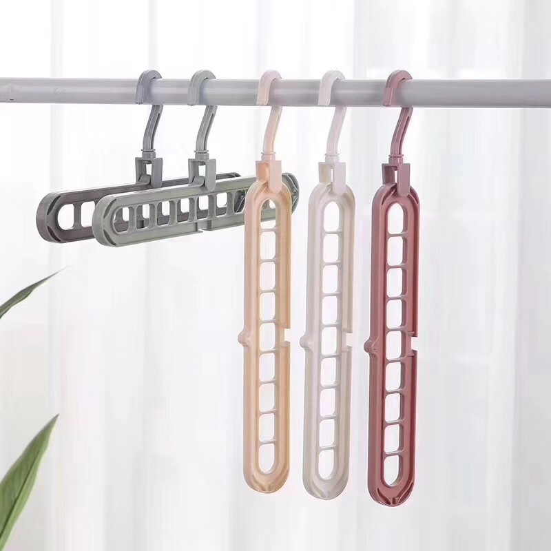 Plastic Multi-function folding hanger nine-hole coat hanger rotating magic clothes rack storage