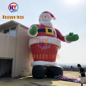 Hot Sale 39ft high inflatable father Christmas and inflatable Santa Claus for decoration and advertising