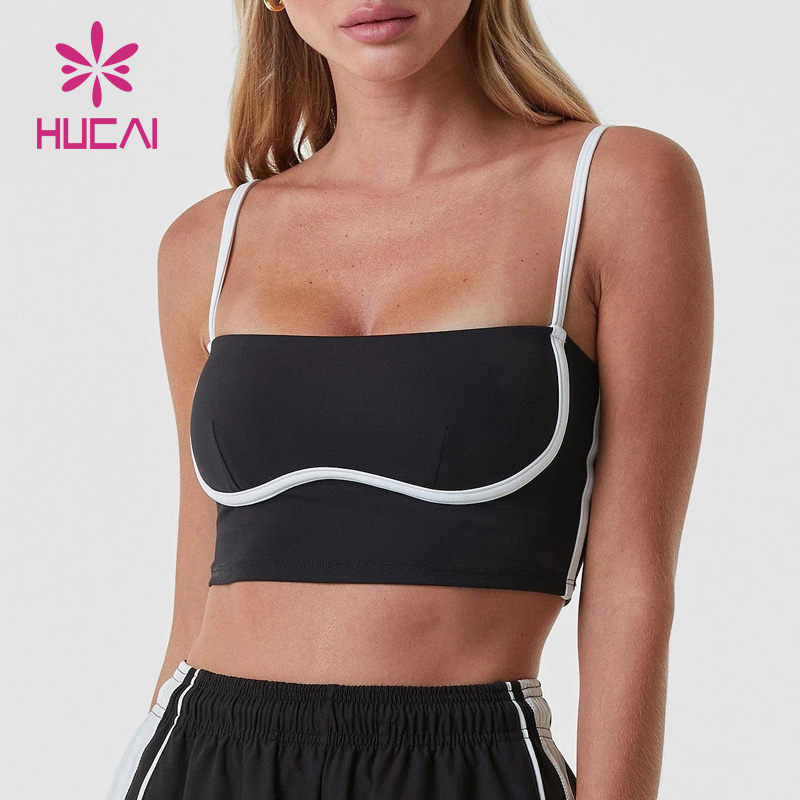 HUCAI OEM Polyester Spandex splicing strip slim fitting curved women training workout gym yoga crop tank top build in bra