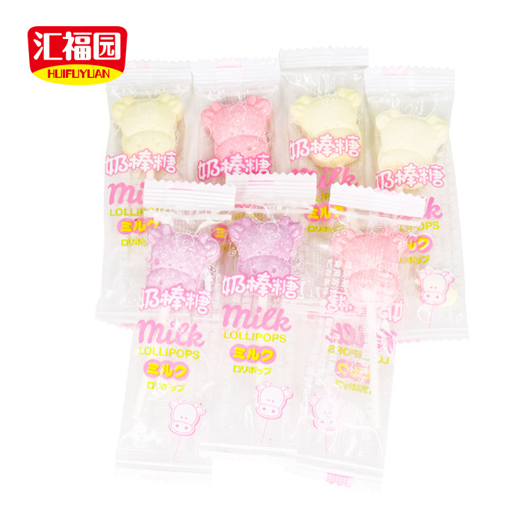 Wholesale cheap milk flavor cow shape tablet compress candy