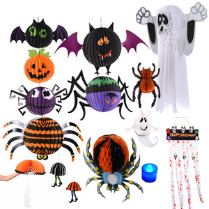 Halloween hanging 3D folding decorated paper lanterns, spooky witches spider pumpkins. Hang round colored paper lanterns