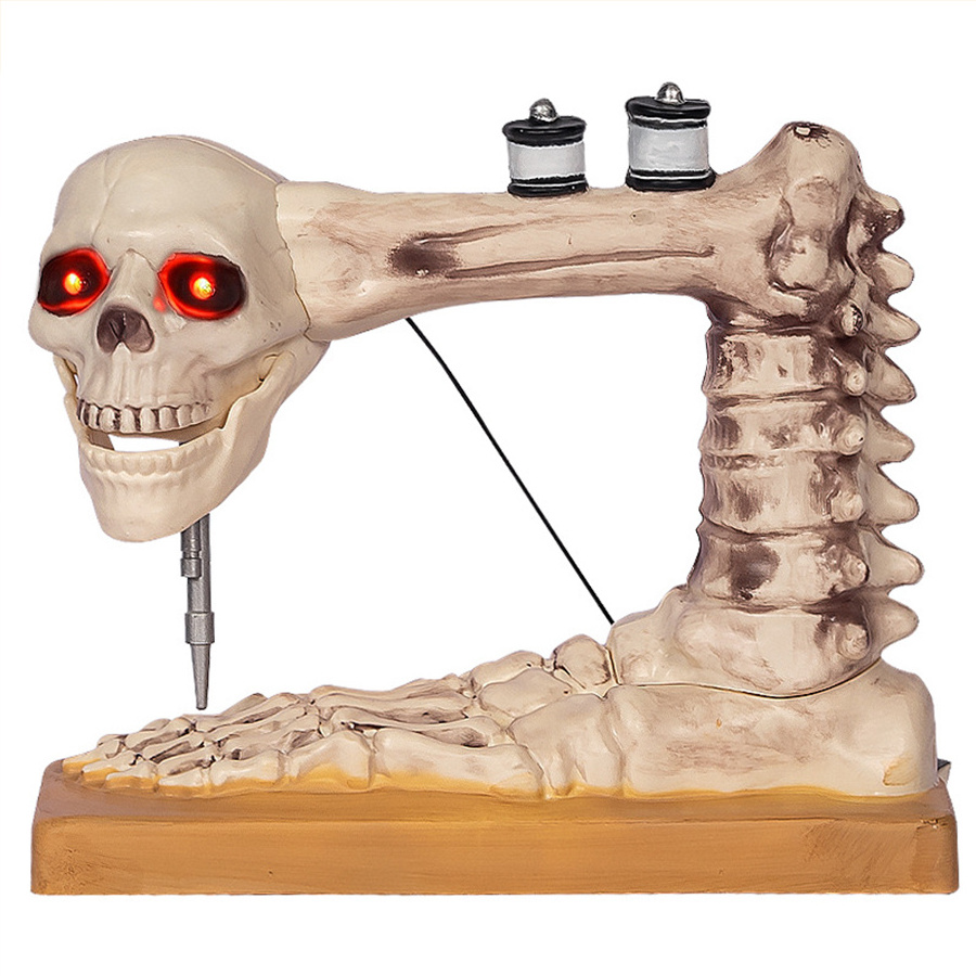 A voice-activated sewing machine is decorated with a moving skeleton Halloween prop