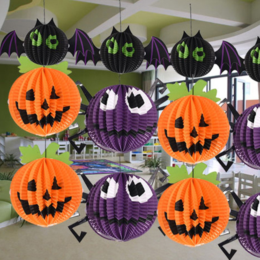 Halloween hanging 3D folding decorated paper lanterns, spooky witches spider pumpkins. Hang round colored paper lanterns