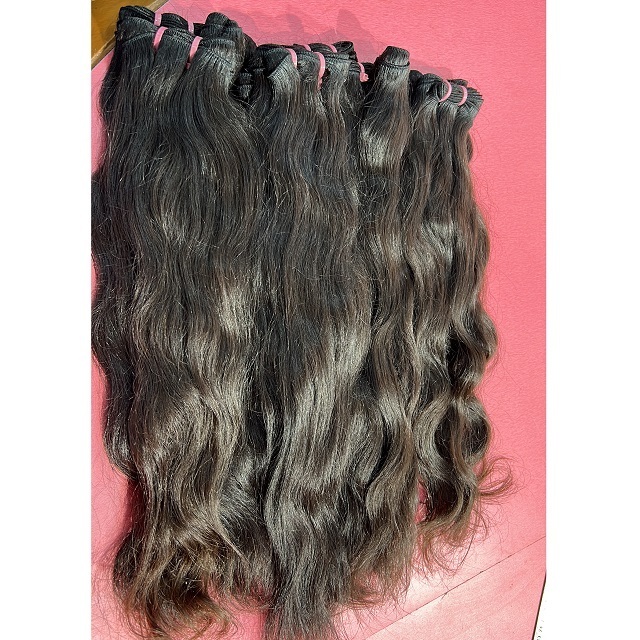 straight Indian Machine Weft Single drawn natural Human Hair 100-gram Bundles sourced from temples.