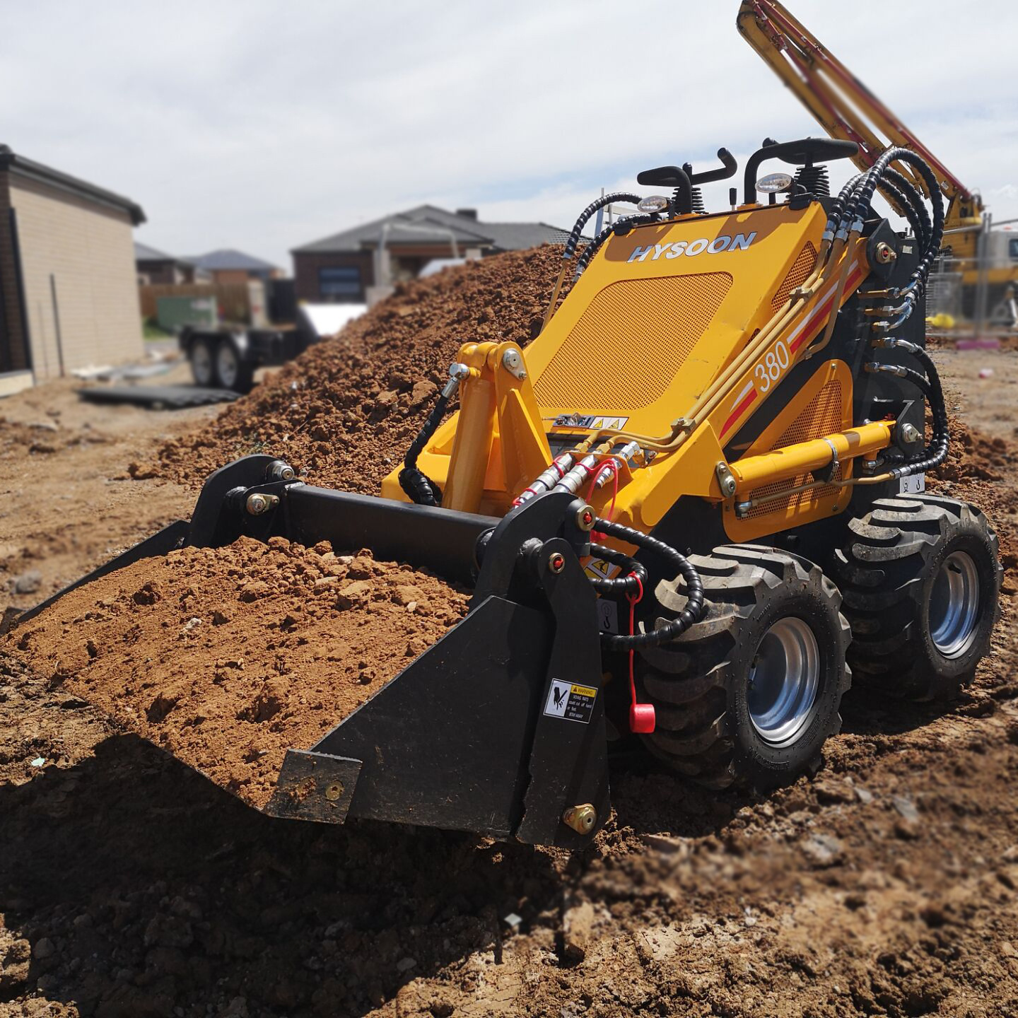 Mini skid steer loader lawn mower