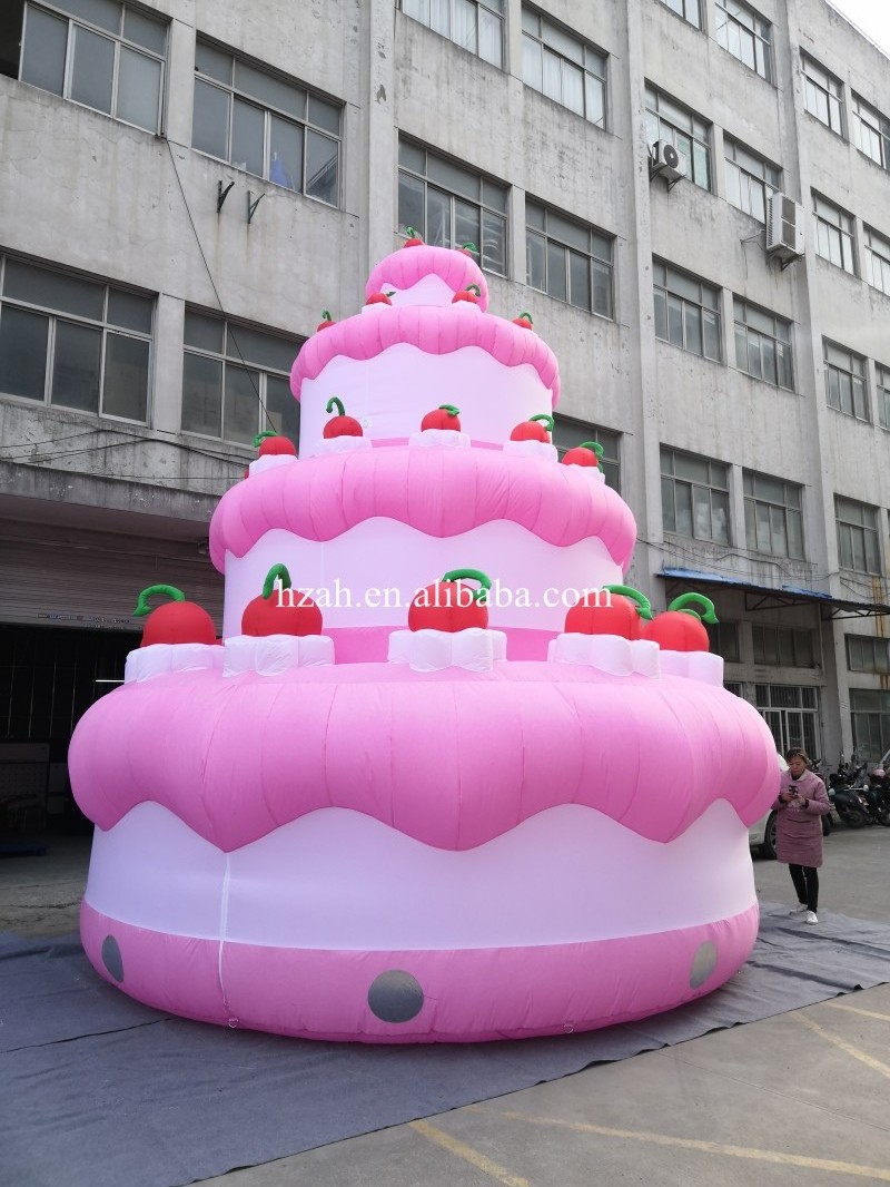 Custom pink inflatable birthday cake with cherry cream model for mall anniversary celebrating