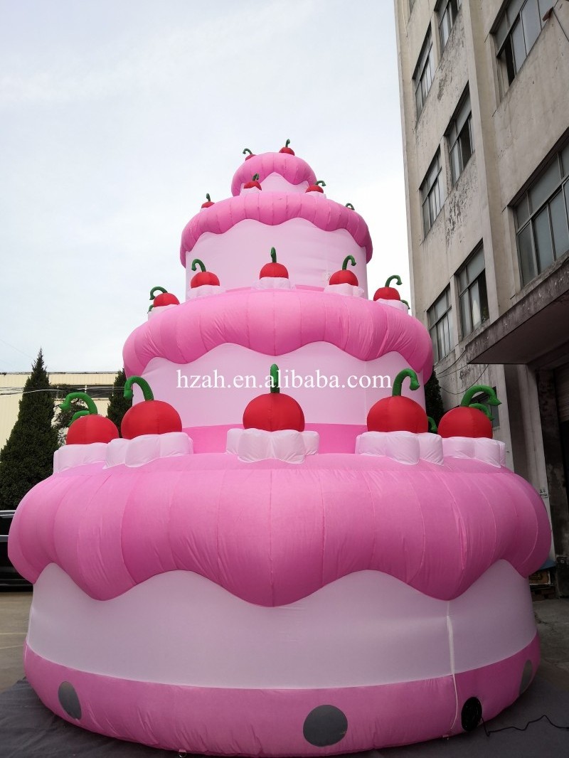 Custom pink inflatable birthday cake with cherry cream model for mall anniversary celebrating