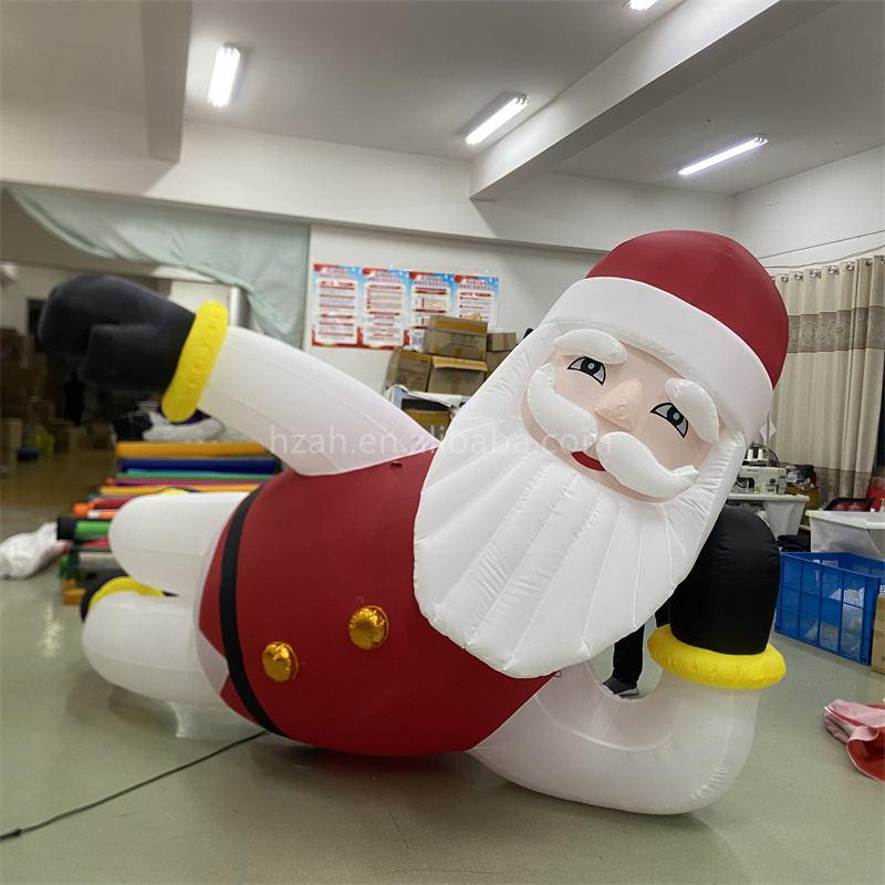 Outdoor Xmas giant inflatable Santa Claus blow up lying santa for sale