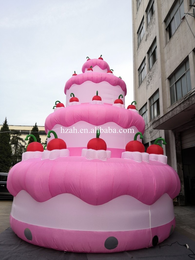 Custom pink inflatable birthday cake with cherry cream model for mall anniversary celebrating