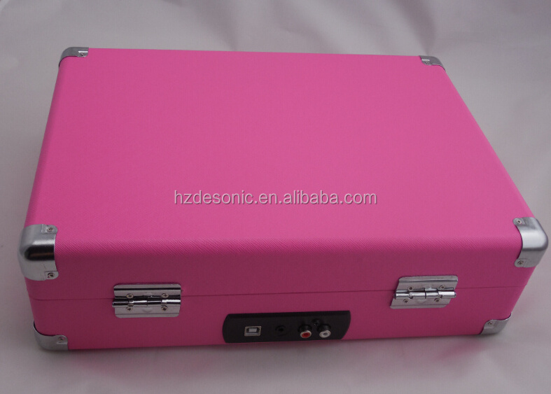 Pink record player or turntable with phonograph and tonearm turntable