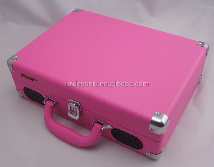 Pink record player or turntable with phonograph and tonearm turntable