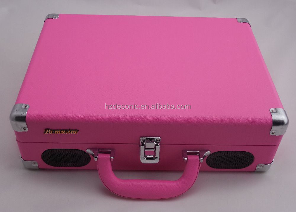 Pink record player or turntable with phonograph and tonearm turntable