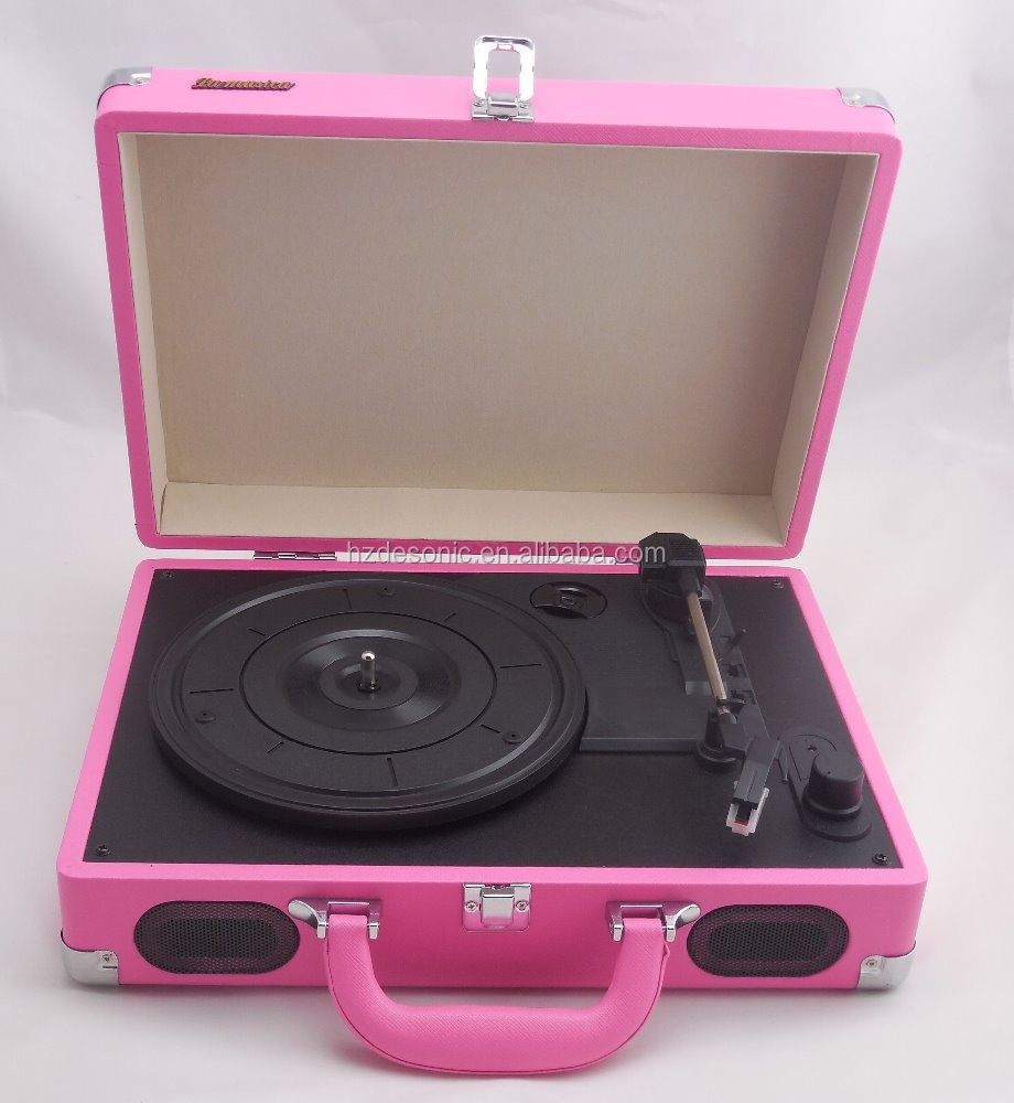 Pink record player or turntable with phonograph and tonearm turntable