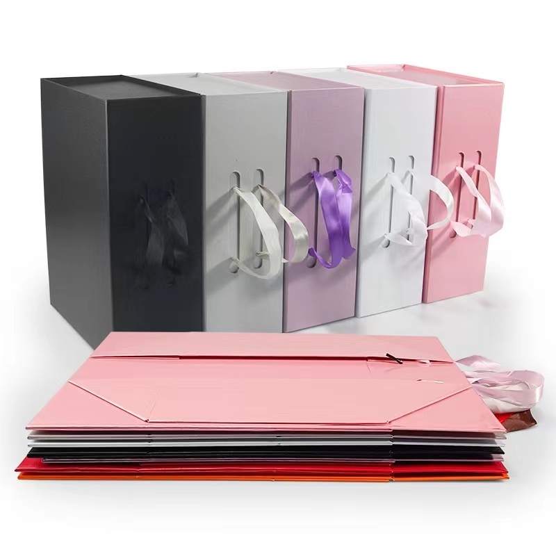 Custom Logo wholesale Luxury foldable Magnet clothing packaging boxes with Ribbon