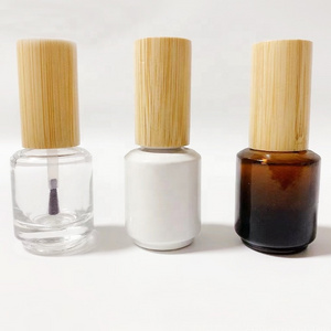 Eco Friendly Custom Logo Wooden Cap Bamboo Lid Nail Polish Glue Empty Bottle 5ml 10ml 15ml Round Nail Polish Bottle with Brush