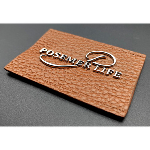 New arrival custom metal clothing label metal garment brand name labels custom embossed leather label