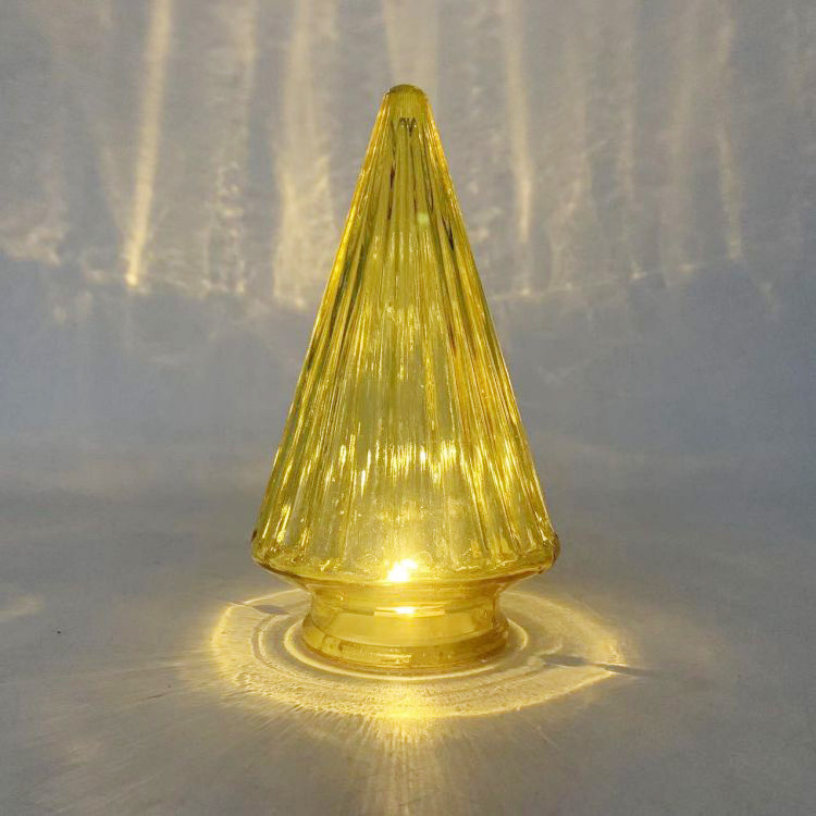 Bright LED lit warm yellow Christmas glass tree with creative conical design suitable for home and mall decoration