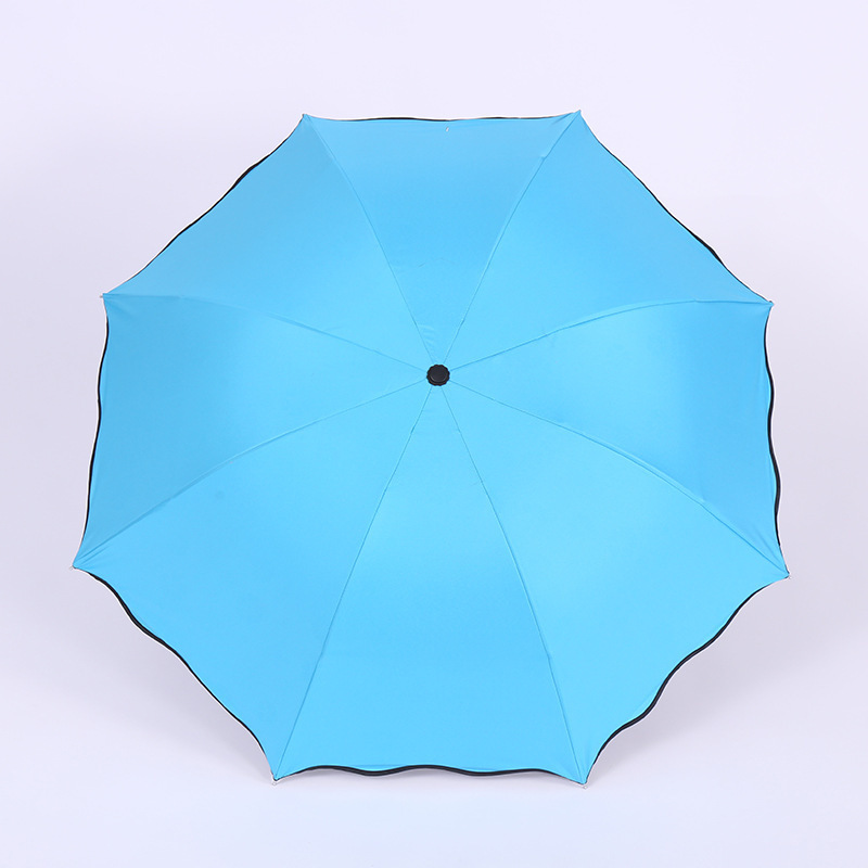 Creative rain umbrella black glue super sunscreen umbrella customized three-fold umbrella