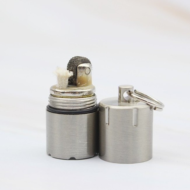 Creative key chain pendant outdoor kerosene lighter mini compact kerosene capsule gasoline lighter pocket gasoline lighter