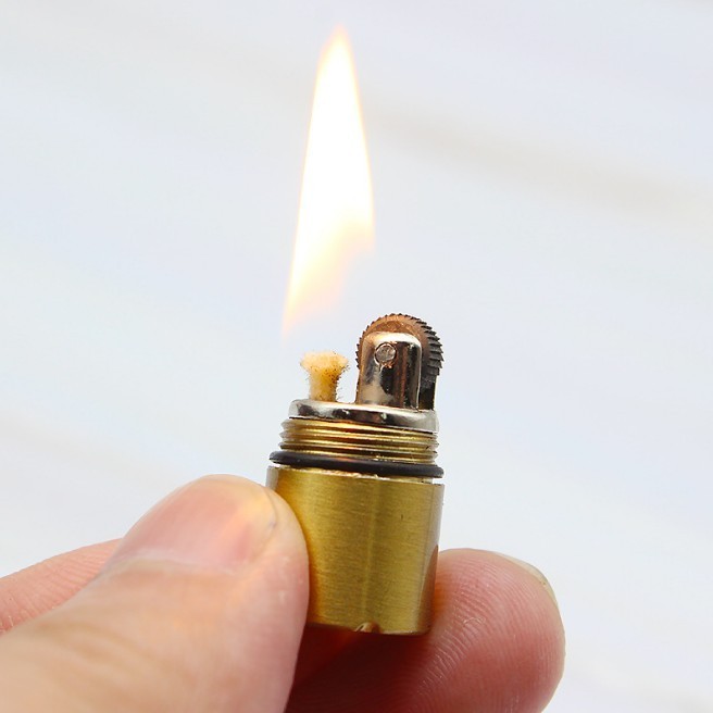 Creative key chain pendant outdoor kerosene lighter mini compact kerosene capsule gasoline lighter pocket gasoline lighter