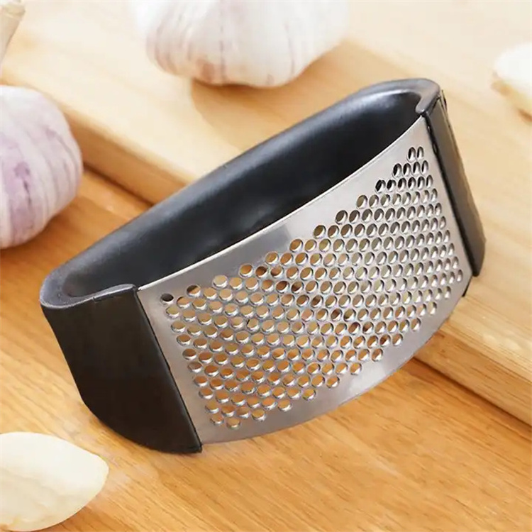 Handheld Stainless steel garlic press thickened kitchen accessories for sale