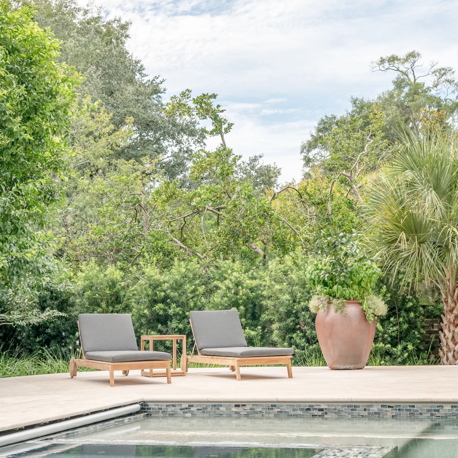 Chaise Lounge  with its oversized wheels and sleek slat design