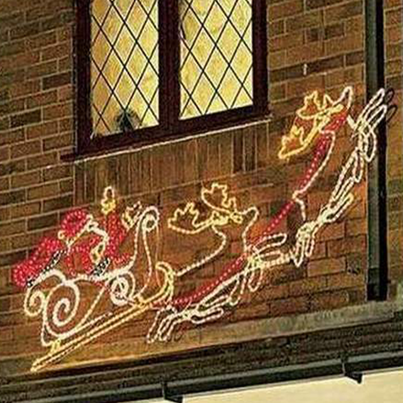 Outdoor lighted Santa reindeer sleigh sled in sky animated moving Christmas light silhouette LED flying reindeer