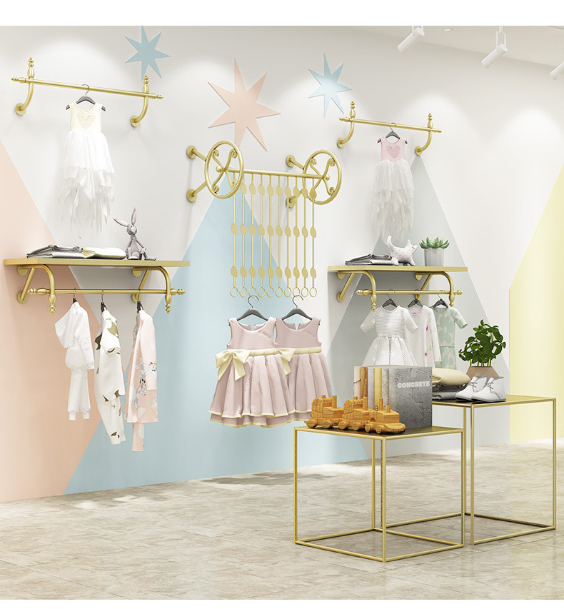 Shiny Gold Wall Mounted Hanging Rail Kids Clothes Display Rack ,Children Clothing Dress Shop Fittings Interior Design