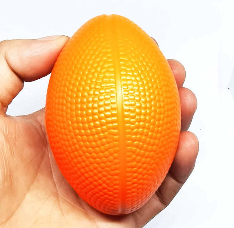 Custom logo pu foam anti stress toy ball 8.5* 6cm solid american football stress relief squeeze ball toys