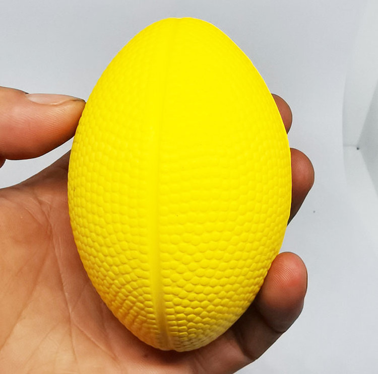 Custom logo pu foam anti stress toy ball 8.5* 6cm solid american football stress relief squeeze ball toys