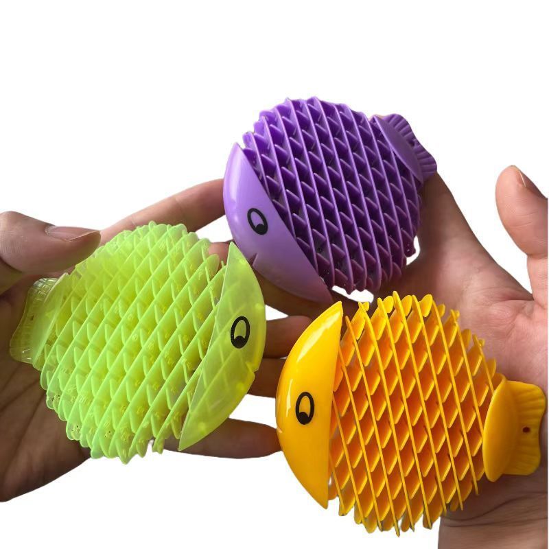 Decompression elastic net small toy decompression deformation fish expansion novelty toy worm keychain sensory fidgets toy